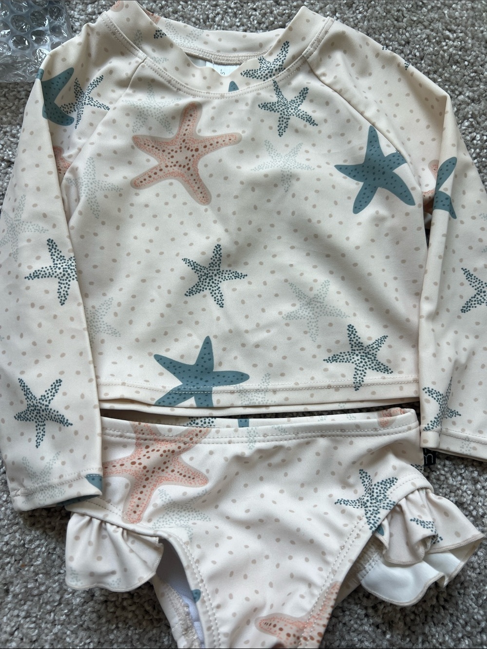 Cream Starfish Rashguard Set for Kids - Long Sleeve Swim Top & Ruffle Bottoms